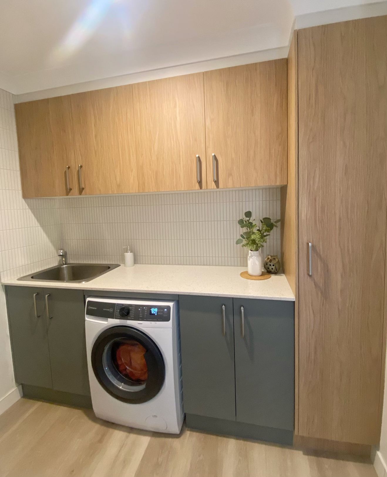 Small modern kitchen with wood cabinets — Piscopo Kitchens Plus In Forster, NSW