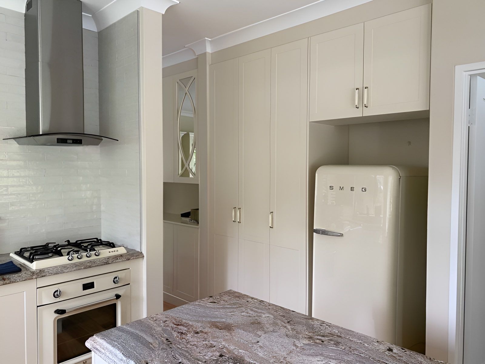 Modern Kitchen With Cream Cabinets — Piscopo Kitchens Plus In Forster, NSW