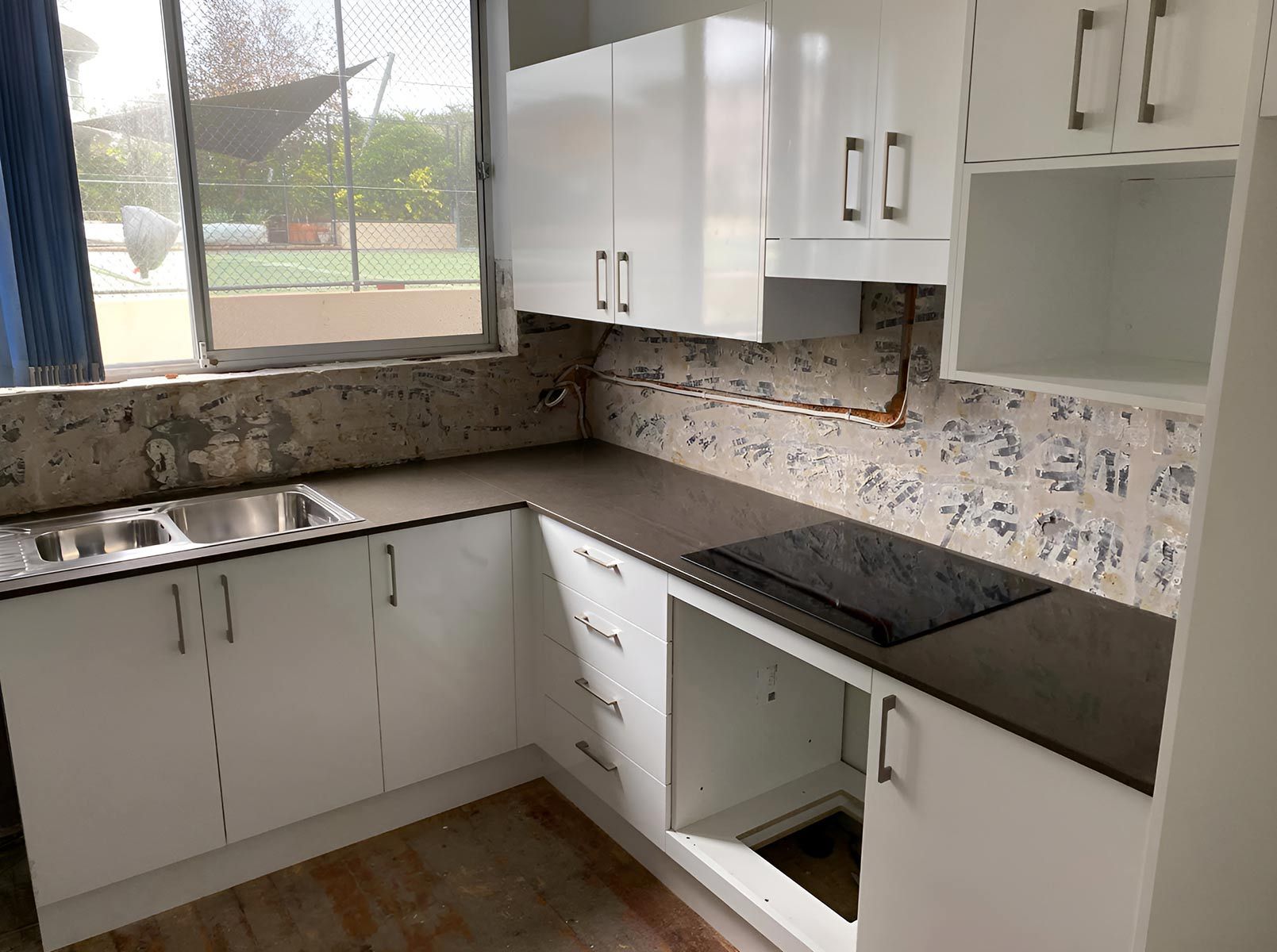 Modern Kitchen With White Cabinets and a Double Sink — Piscopo Kitchens Plus In Wingham, NSW