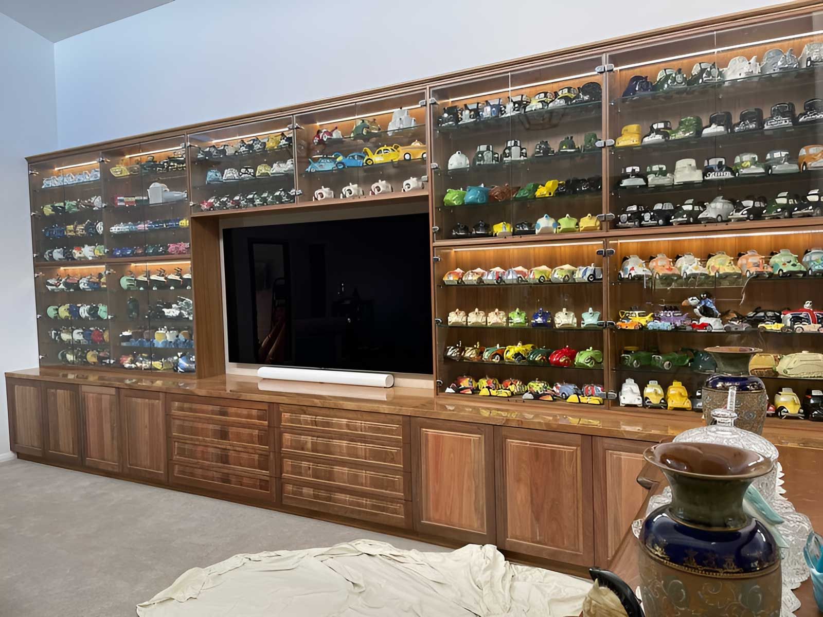 Wooden Shelves and Cabinets Are Filled With Colourful Collections — Piscopo Kitchens Plus In Forster, NSW
