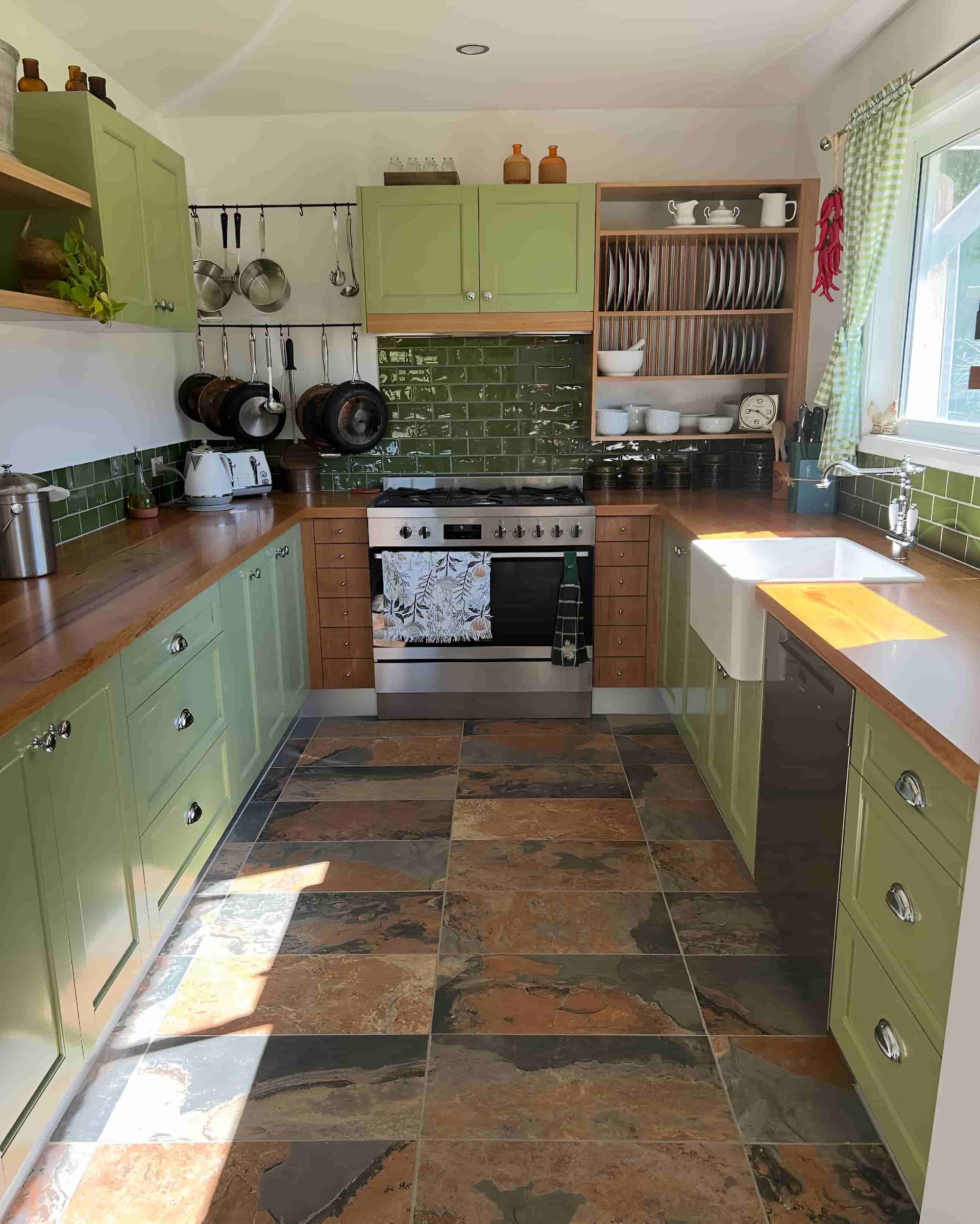 A Kitchen With Green Cabinets and Wooden Countertops — Piscopo Kitchens Plus In Old Bar, NSW