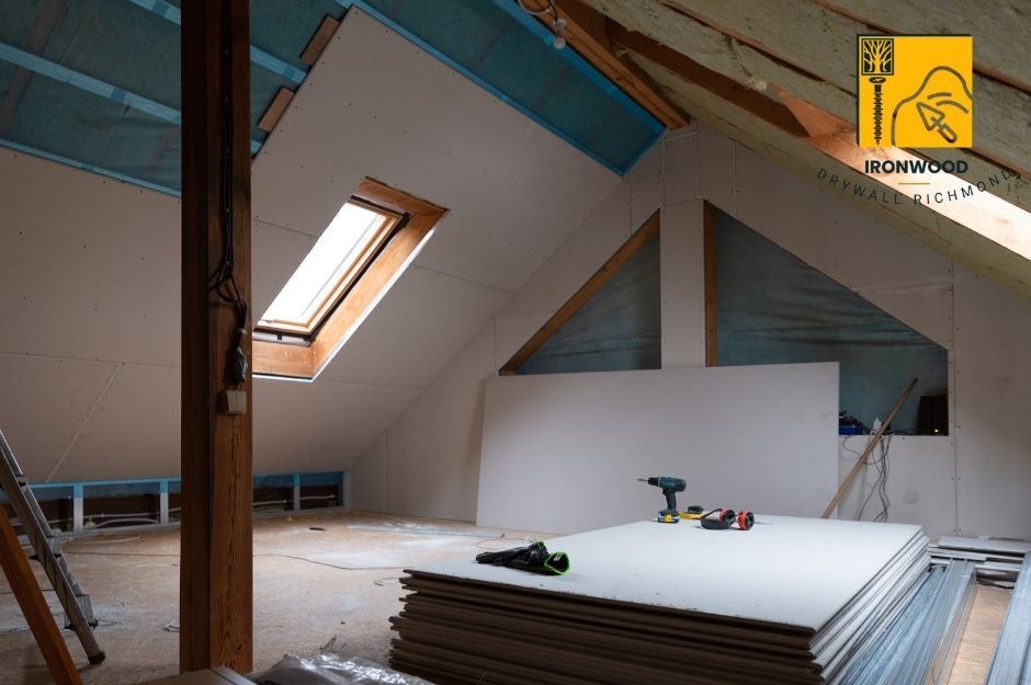 Newly installed drywall in a attic with insulation that creates a modern and energy-efficient space, for a cozy retreat or additional storage.