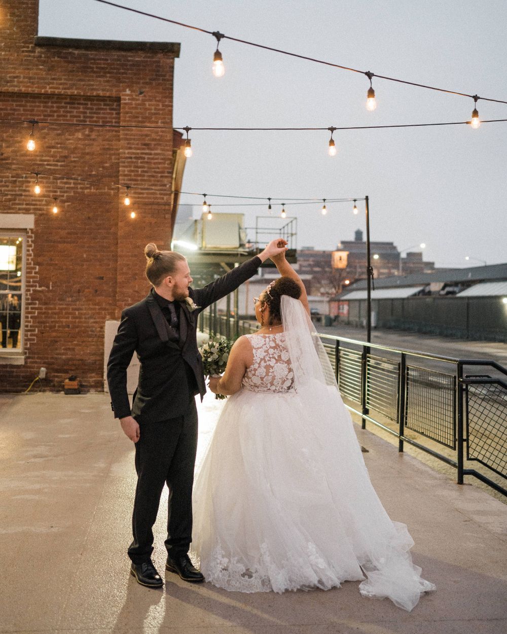 groom twirlingbride