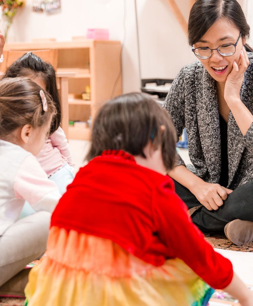 Montessori guide with children