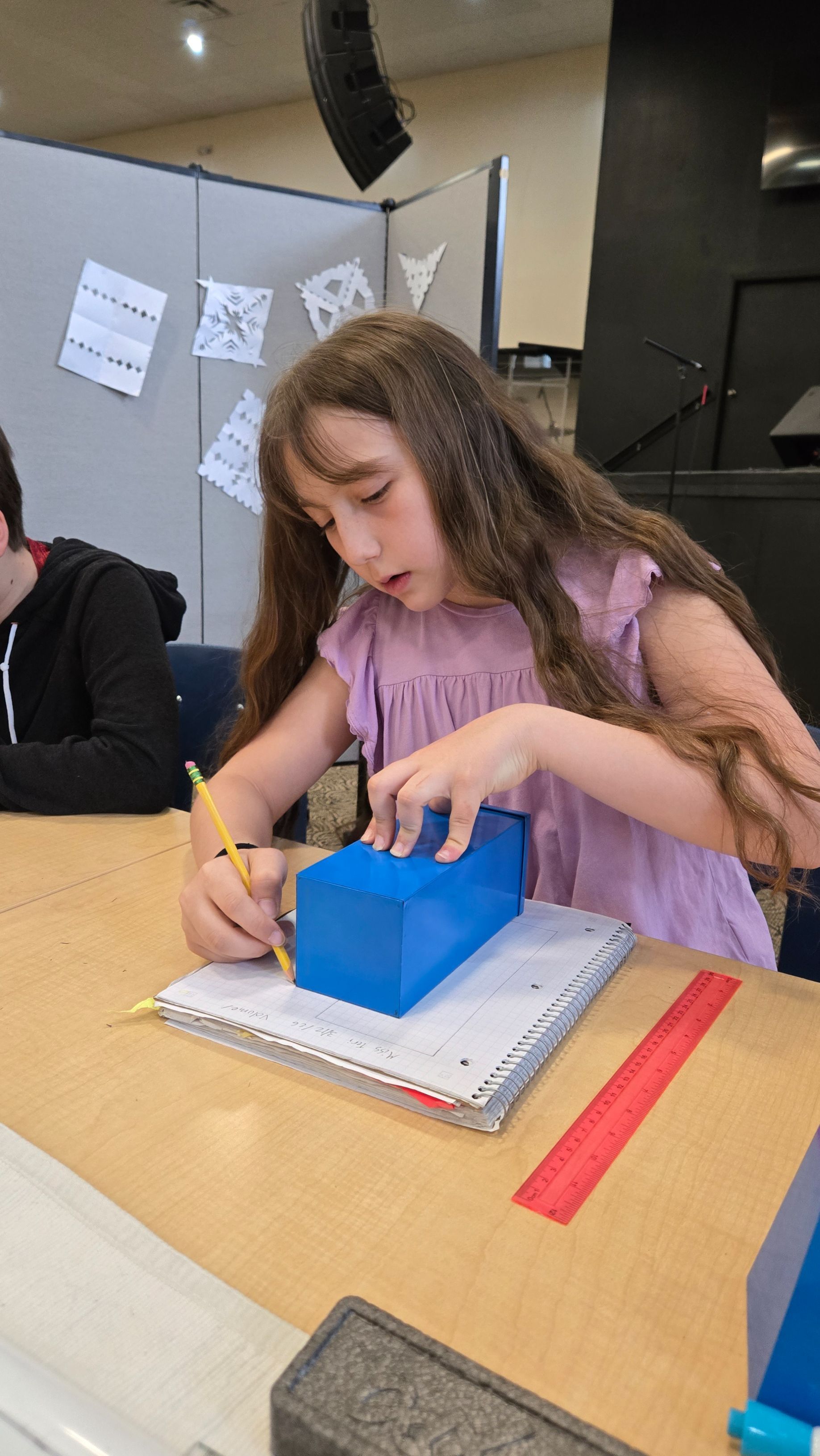 Child working with Montessori materials