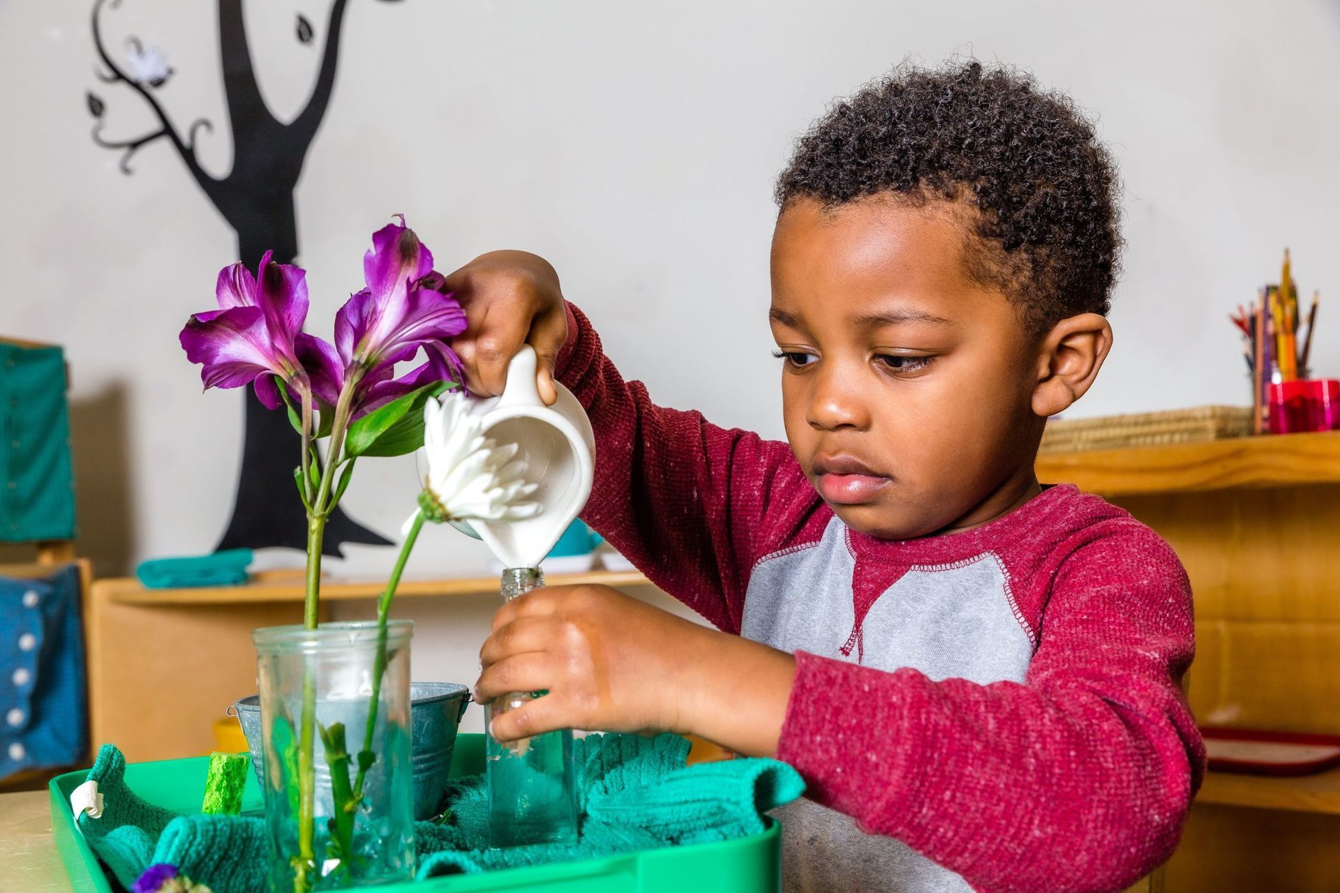Montessori child writing