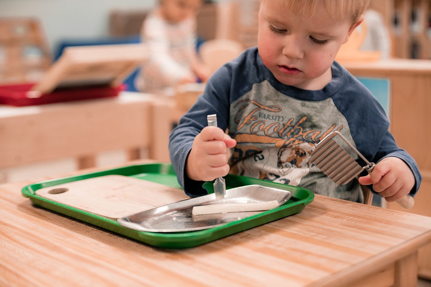 Child working with Montessori materials