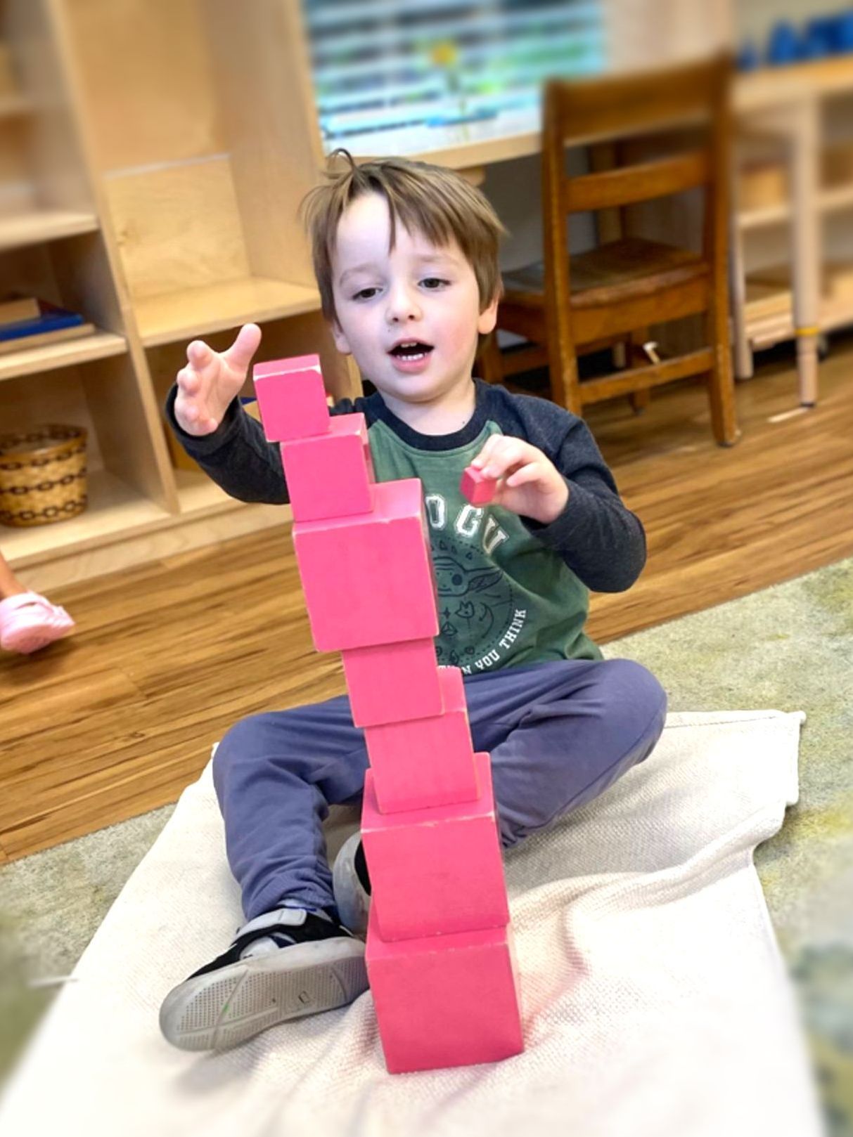 Montessori student working on materials