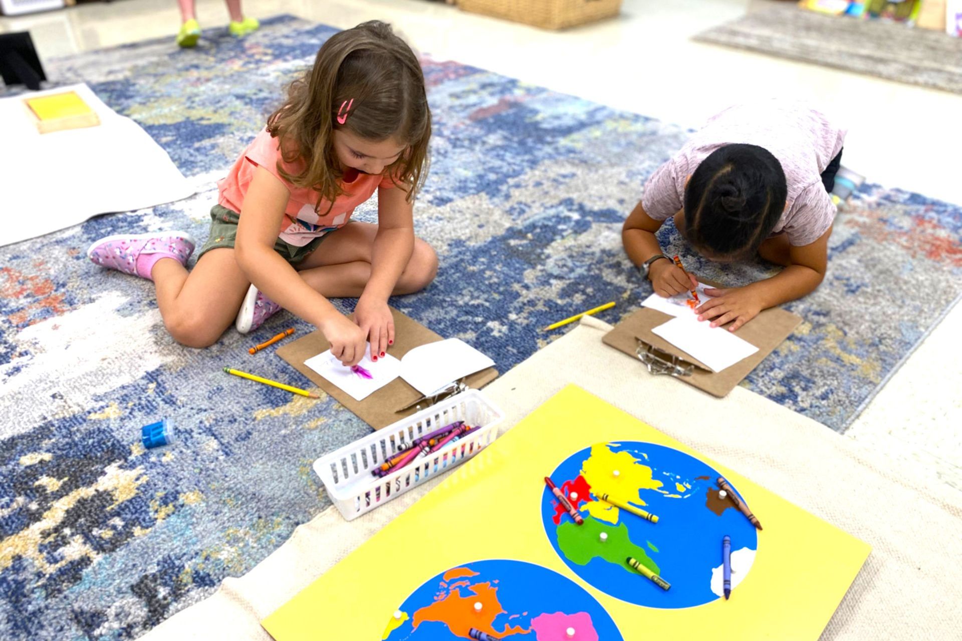 Montessori child working with practical life skills materials