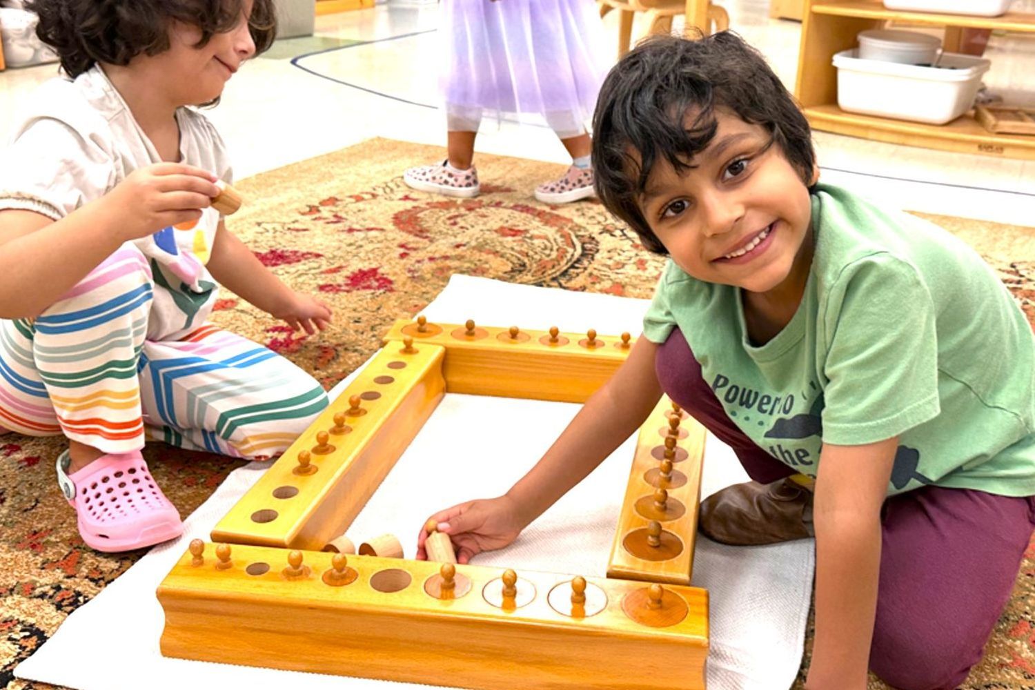 Montessori children working in the classroom