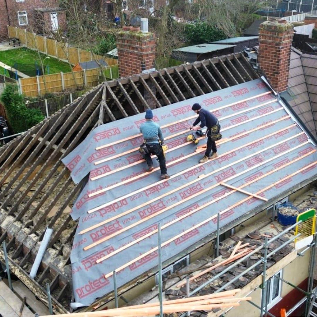 A picture of Hightop Roofers Birmingham replacing a hip roof