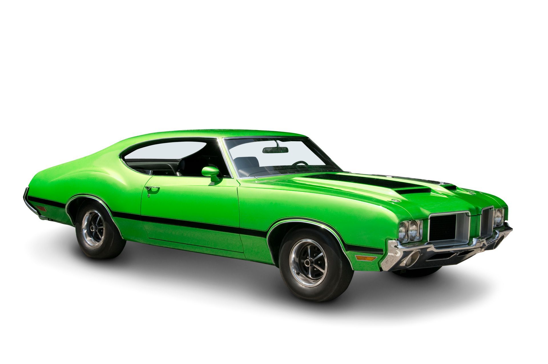 A green oldsmobile cutlass supreme is shown on a white background.