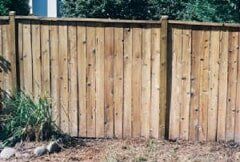 Wooden privacy fence outdoors. 