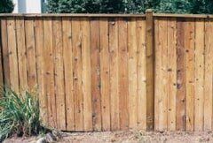 Wooden privacy fence.