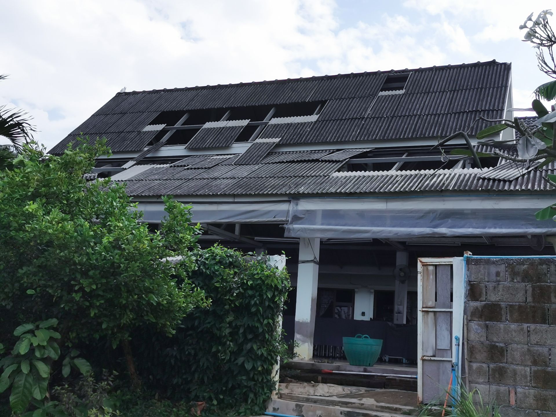 Damaged roof from the storm.