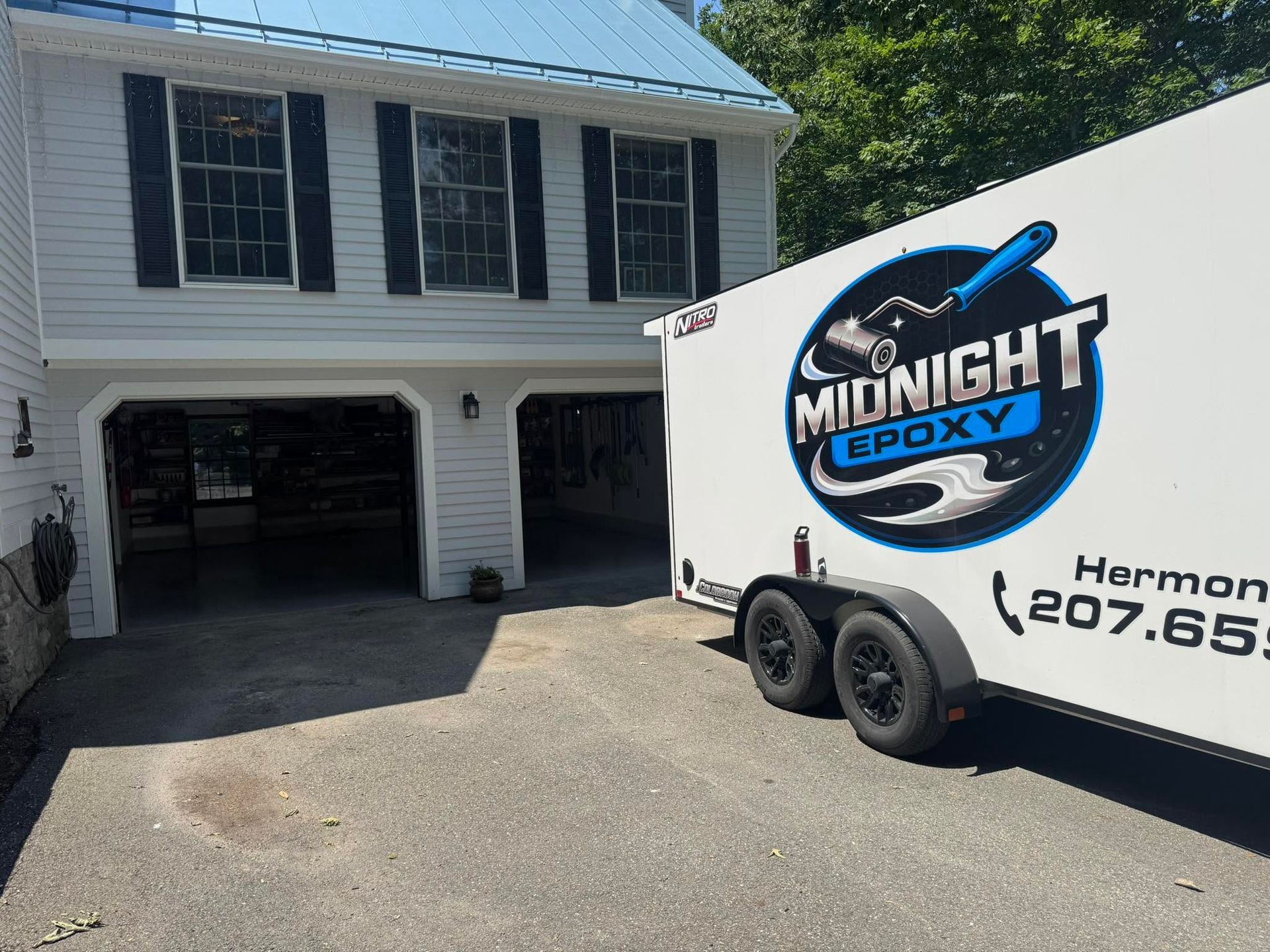 White pickup truck towing a trailer with