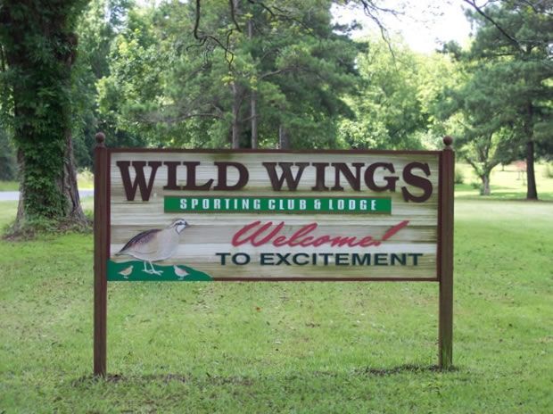 A wooden sign reading 