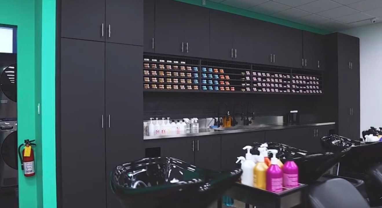 Cosmetology student practicing hands-on techniques