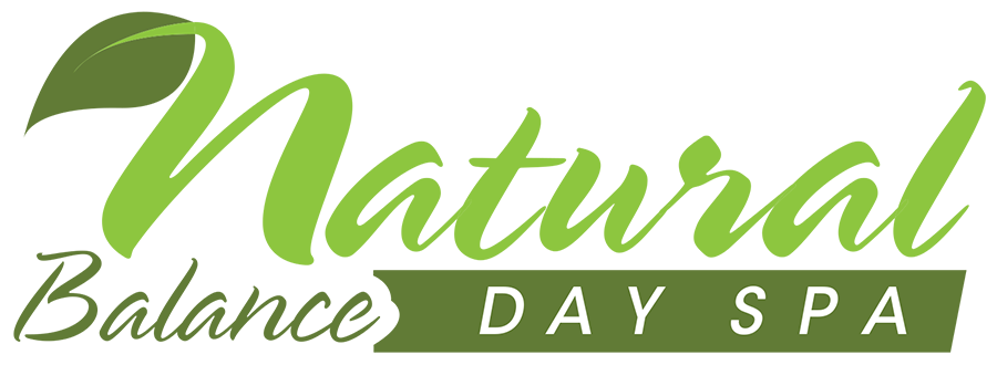 Logo for Natural Balance Day Spa in green with a leaf and banner.