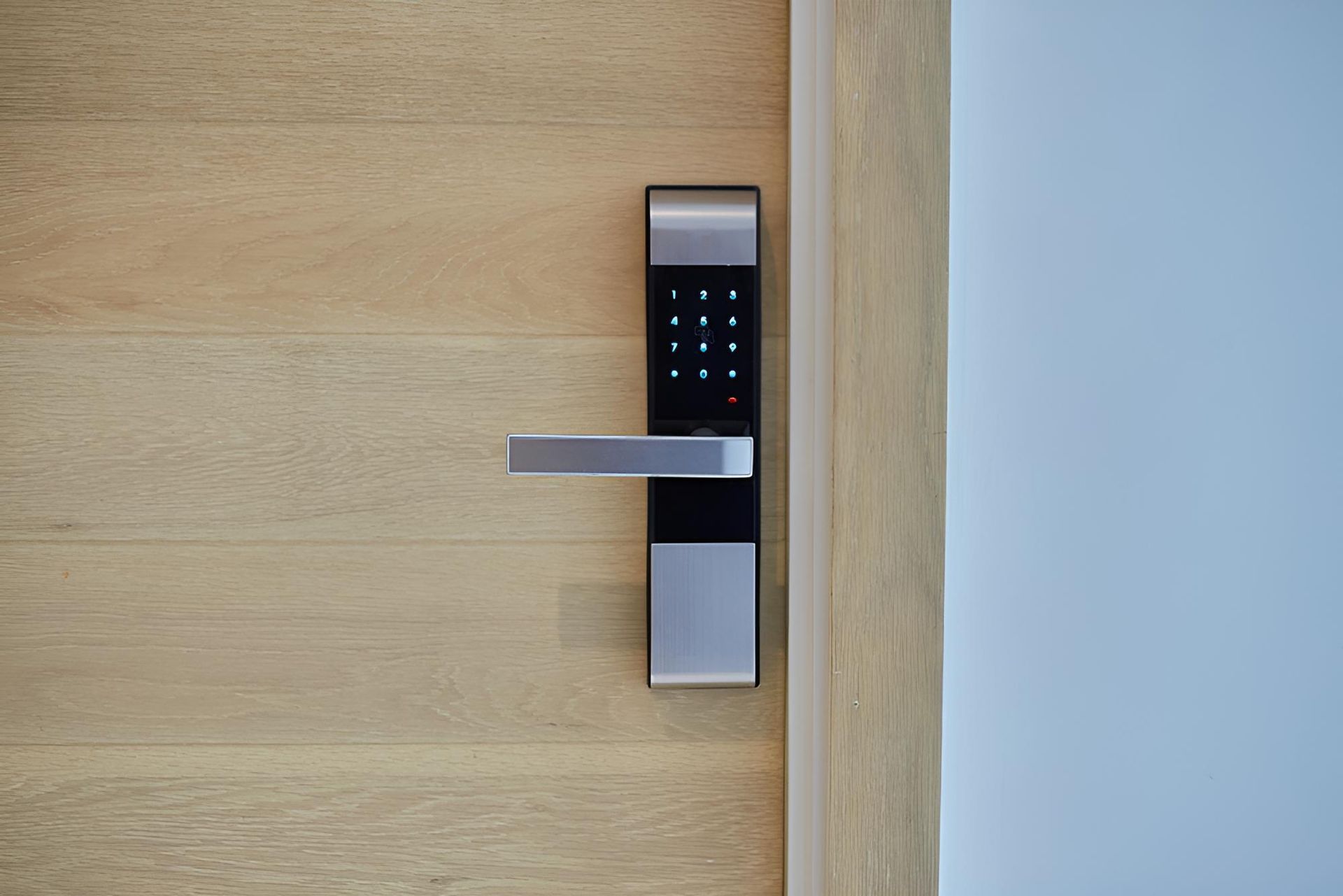 A Close Up of a Digital Door Lock on a Wooden Door — Coffs City Lockmart Pty Ltd in North Boambee Valley, NSW