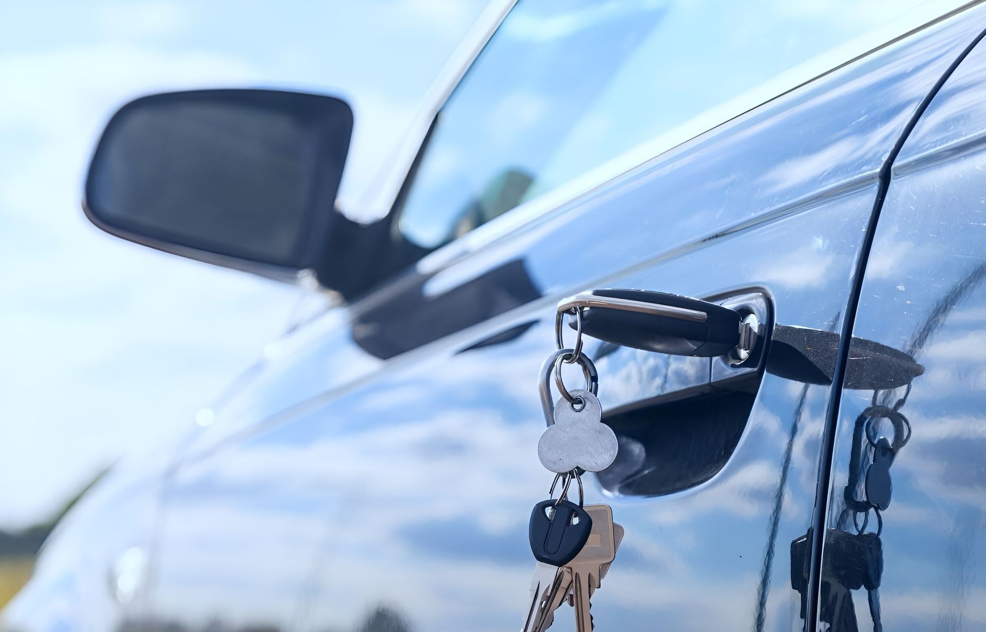 Mobile Locksmith Coffs Harbour Car Key In Vehicle Door — Coffs City Lockmart Pty Ltd in Coffs Harbour, NSW