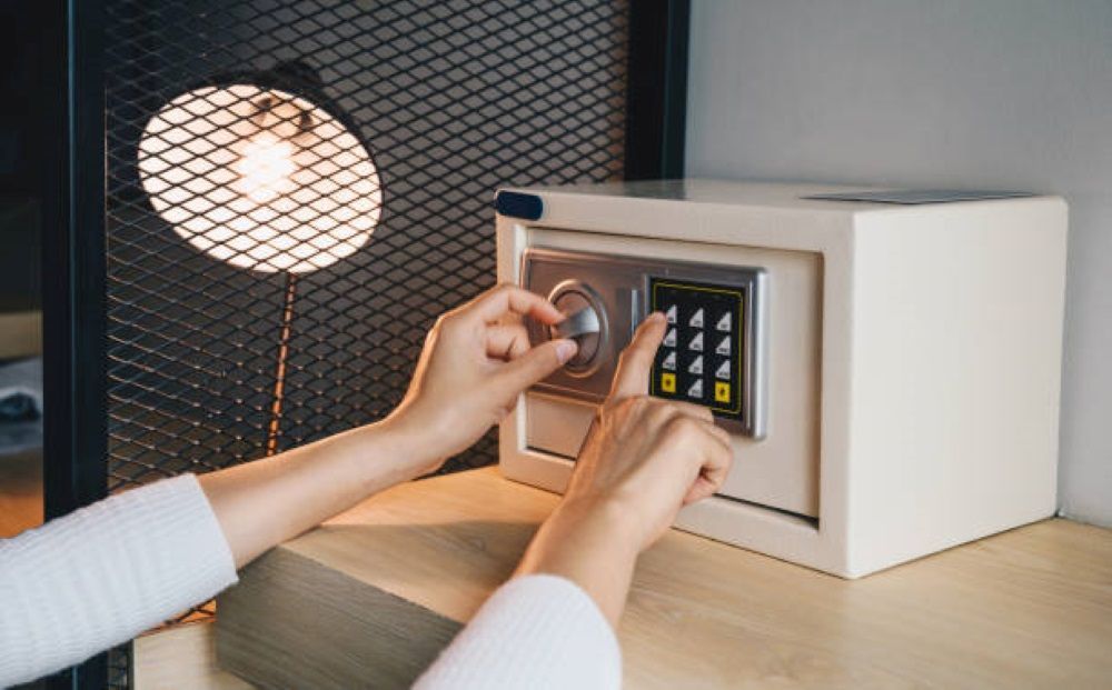 A Person is Opening a Safe With a Keypad — Coffs City Lockmart Pty Ltd in Yamba, NSW
