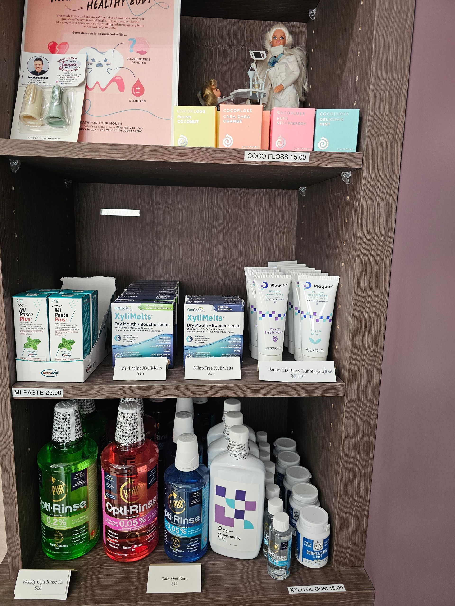 Shelves filled with various skincare and oral care products, including mouthwash bottles and boxed items.