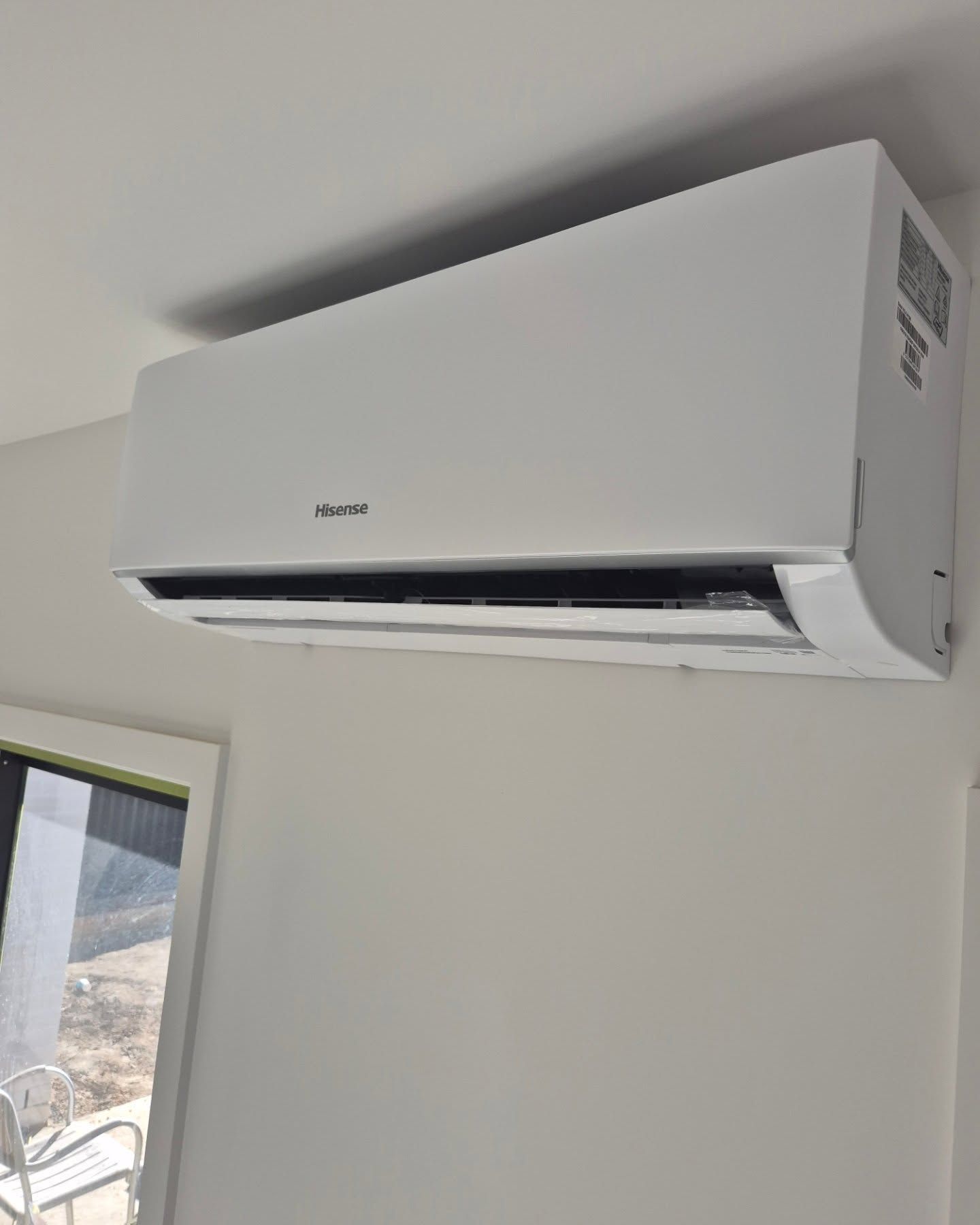 White Wall-Mounted Air Conditioning Unit — Bay & Basin Air Conditioning & Refrigeration Pty Ltd in St Georges Basin, NSW