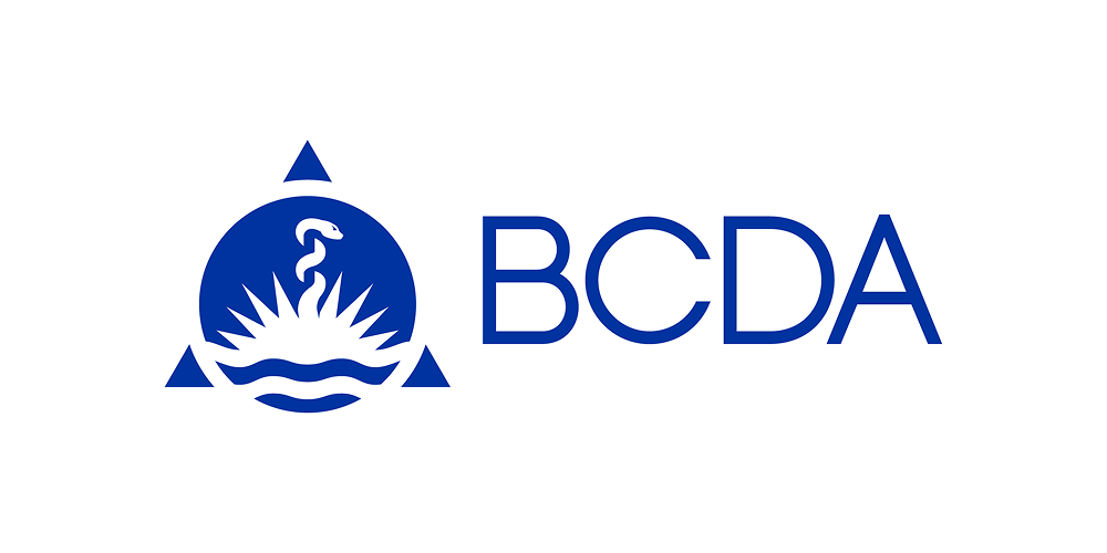 The blue logo of BCDA, featuring a circular icon with a snake-entwined staff, sun rays, and waves, enclosed in a triangle.