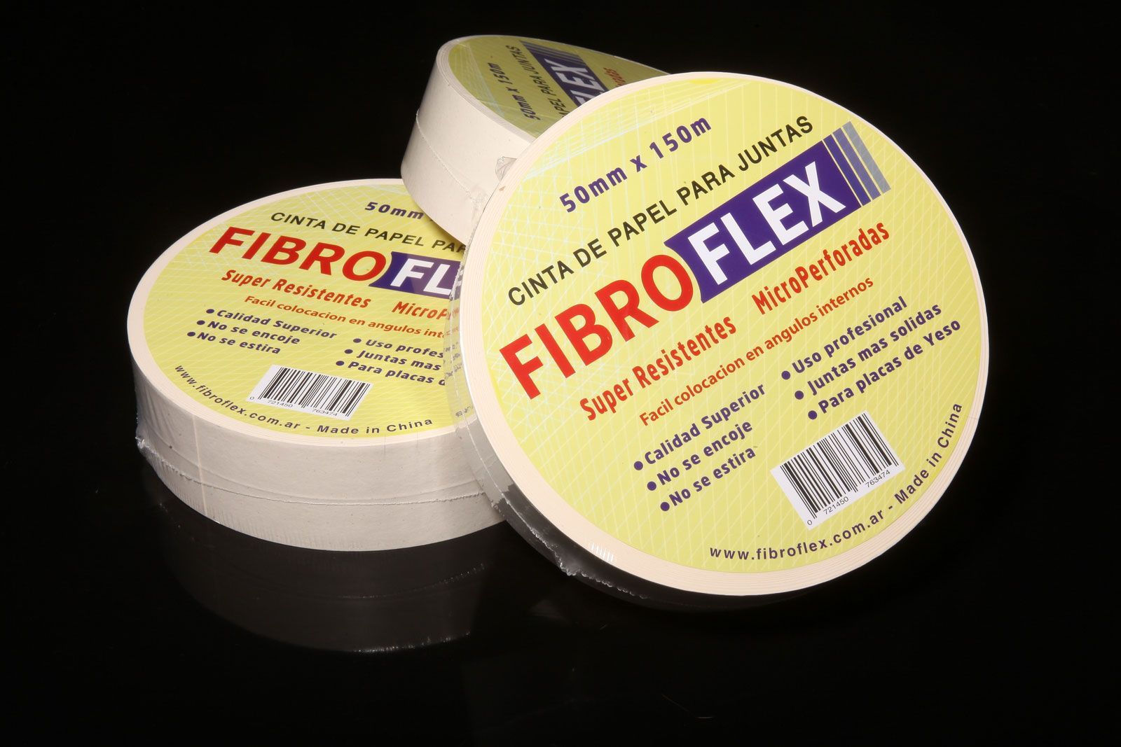 Dos envases amarillos de medicamento Fibroflex sobre un fondo negro, uno abierto y otro cerrado.