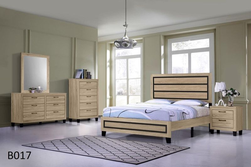 A bedroom with a bed dresser mirror and nightstand