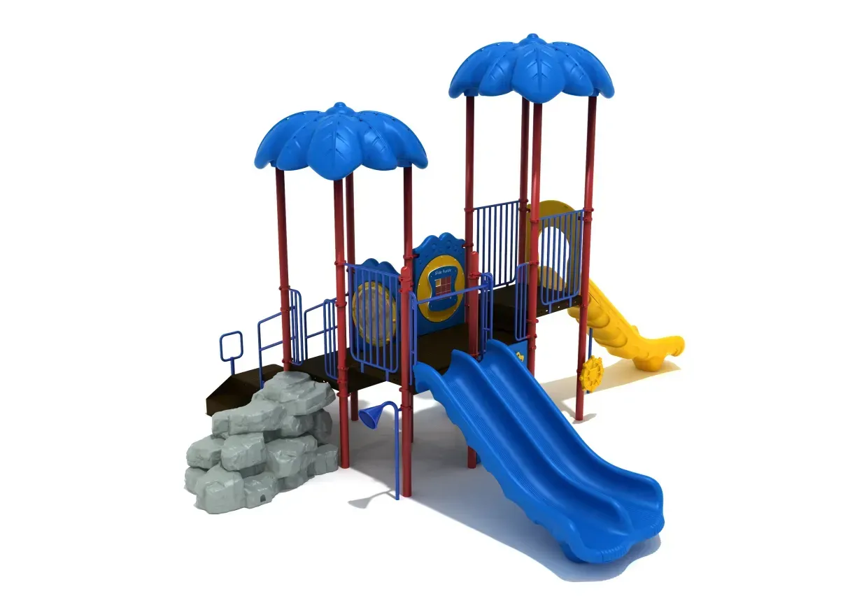 Colorful playground climbing structure with blue slides, yellow slide, rope bridge, and rock steps