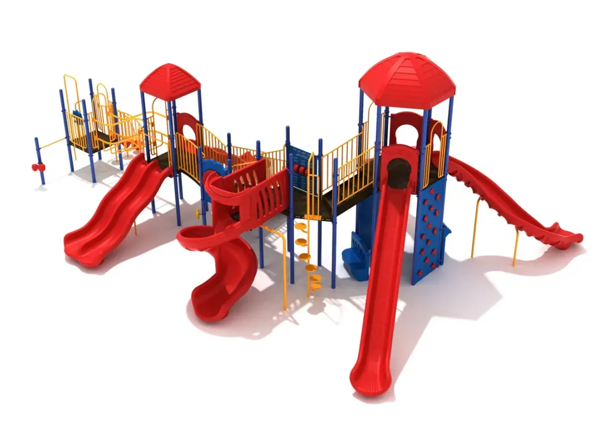 Colorful playground playset with red slides, blue and yellow climbing structures, and red-roofed towers