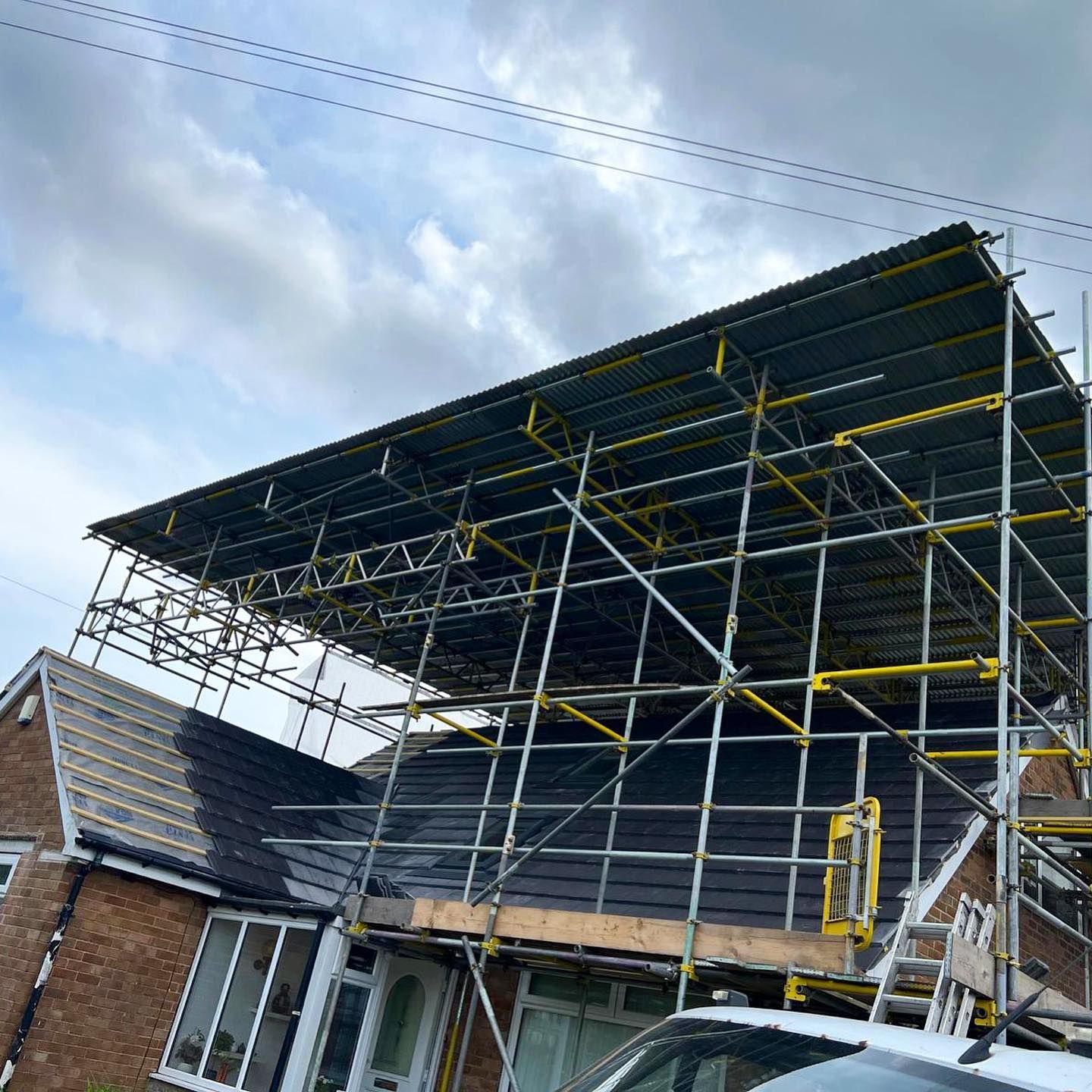 A picture of a roof replacement on a bungalow being carried out by Hightop Roofers Chesterfield