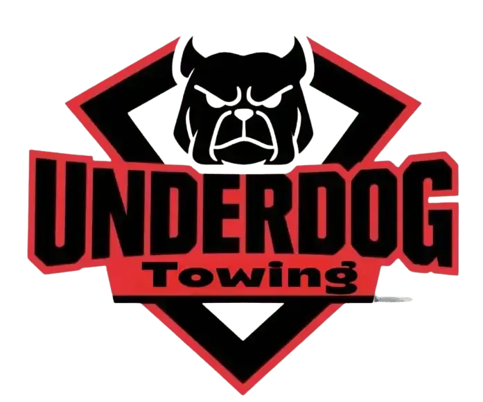 Underdog Towing logo with black bull head in red-outlined diamond and bold black-and-red text