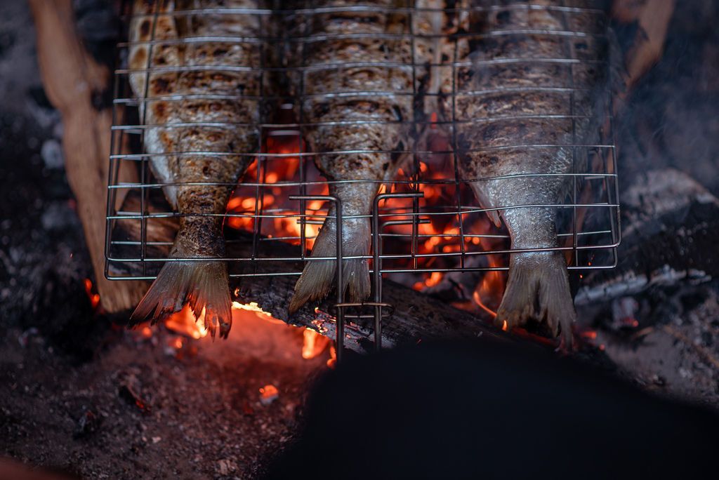Fish Charring on a grill.