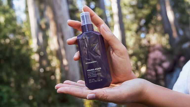 A KEVIN.MURPHY model holding Young.Again