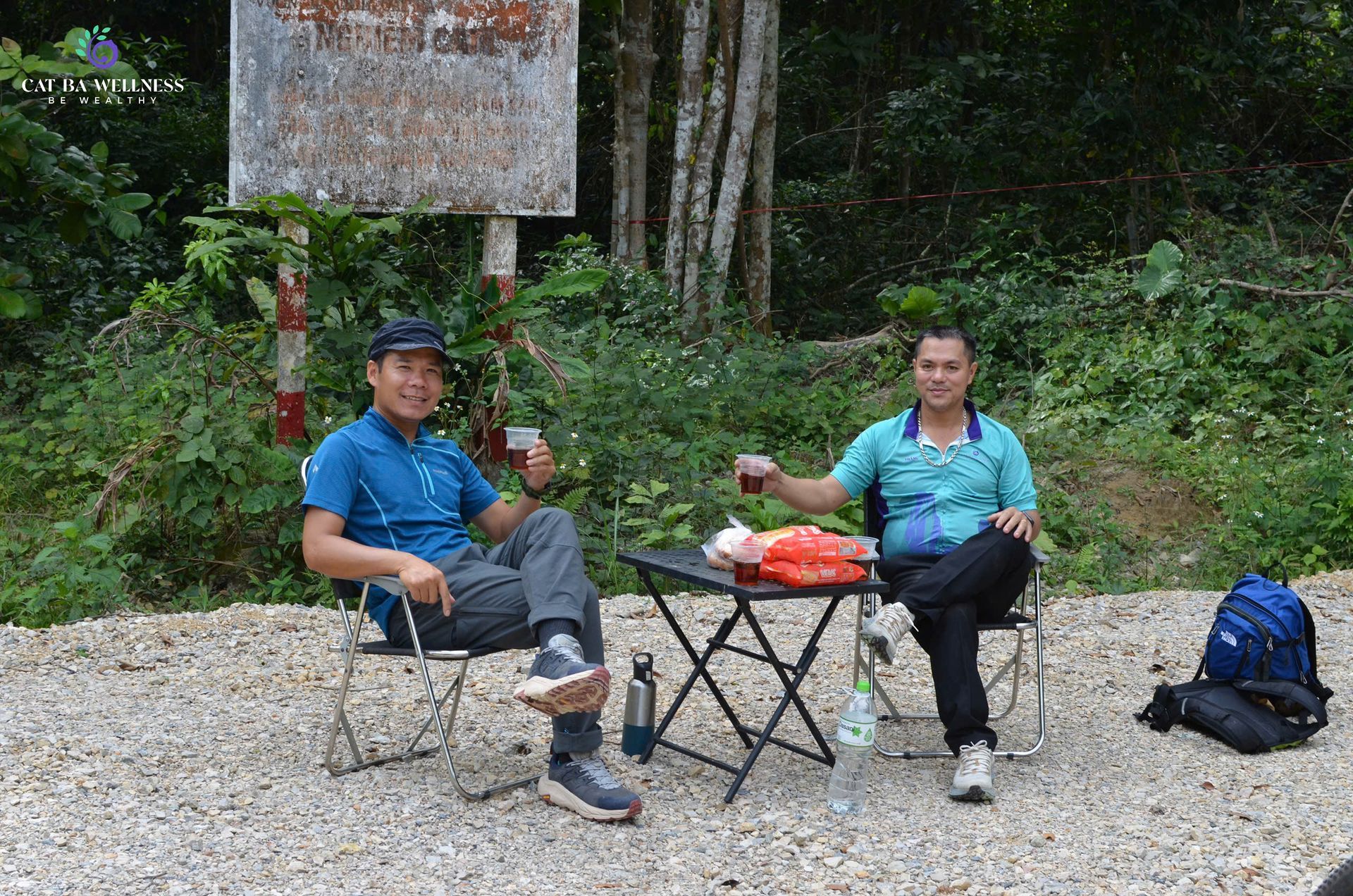 Guides resting during the Cat Ba National Park Cycling Retreat, a wellness cycling tour inside Catba