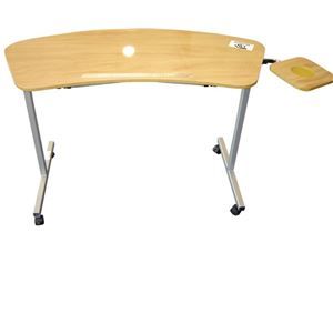 A wooden desk with wheels and a tray on the side