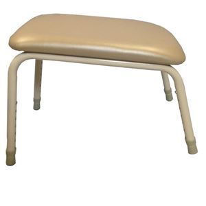 A beige ottoman with a metal frame on a white background.