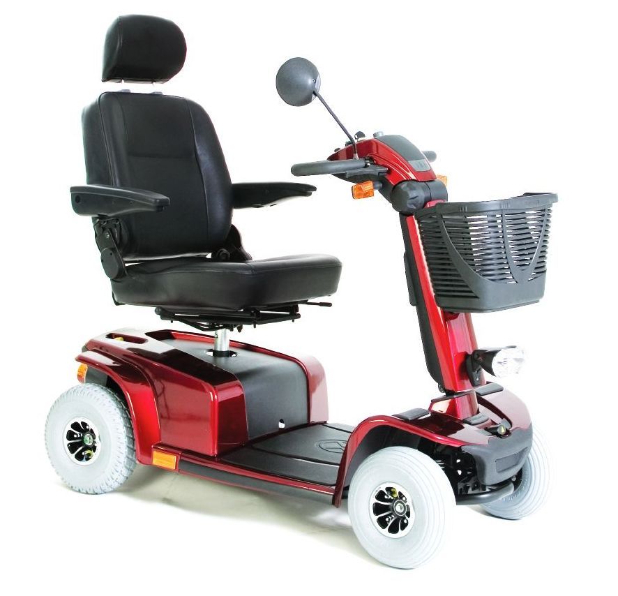 An Elderly Lady Using Motor Scooter — Healthcare Equipment in Lake Macquarie