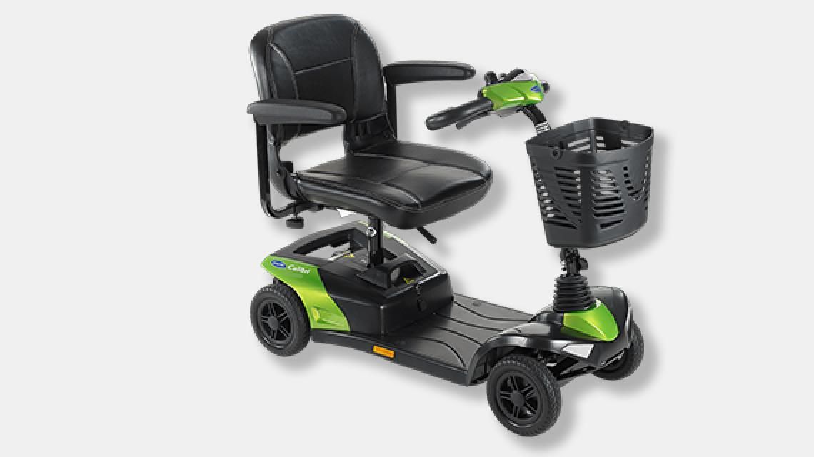 A green and black mobility scooter with a basket on the front.