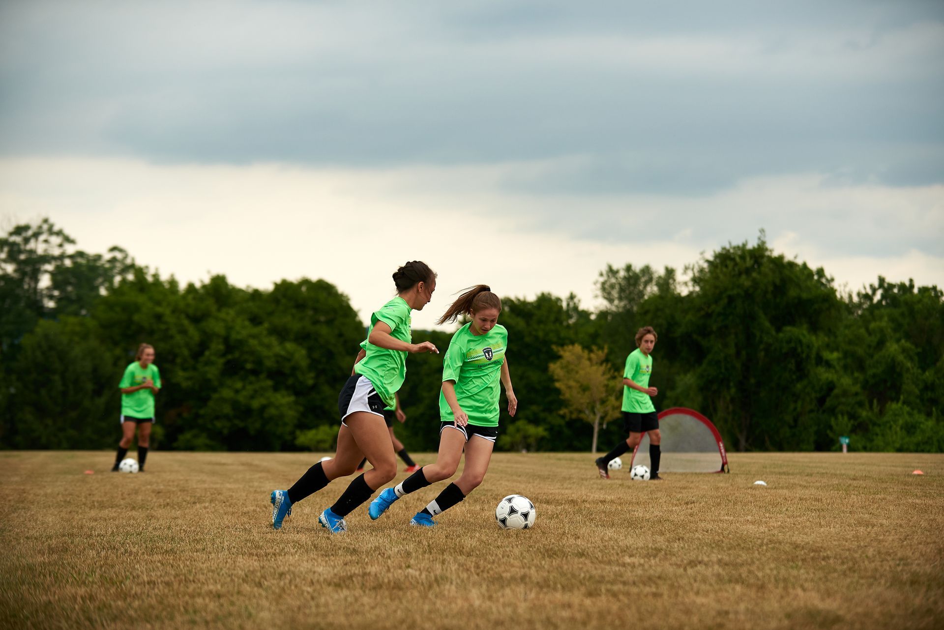 Girls from the JTDF Skills School playing soccer