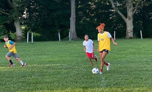 A group of children from the JT Dorsey Foundation playing soccer
