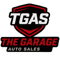 TGAS The Garage Auto Sales logo in red, black, and white shield design
