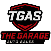 TGAS The Garage Auto Sales logo in red, black, and white shield design