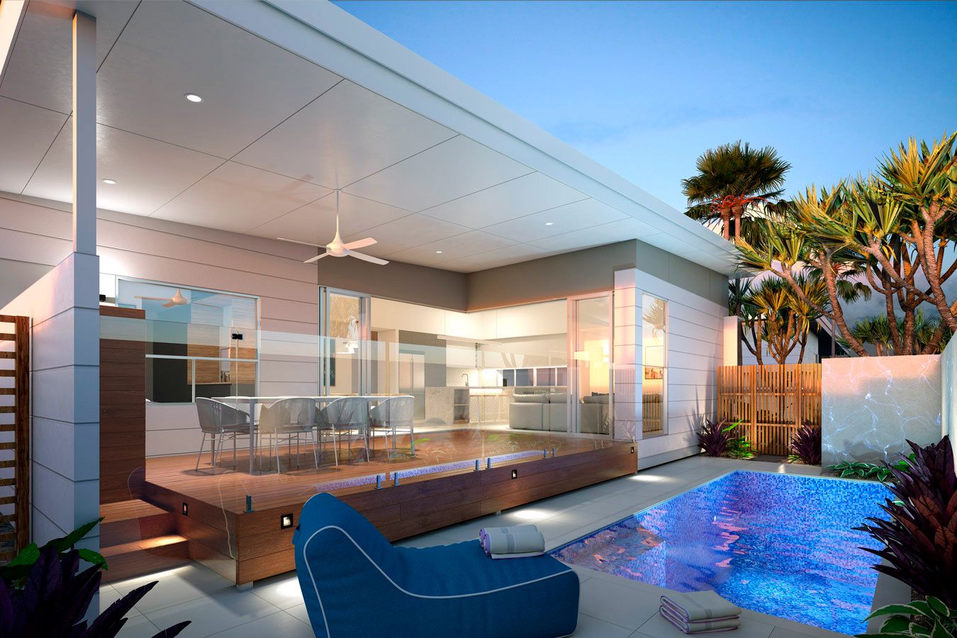 Modern outdoor living space with pool, deck, dining area, and blue bean bag chair— Rob Ward Electrical Services in West Ballina, NSW