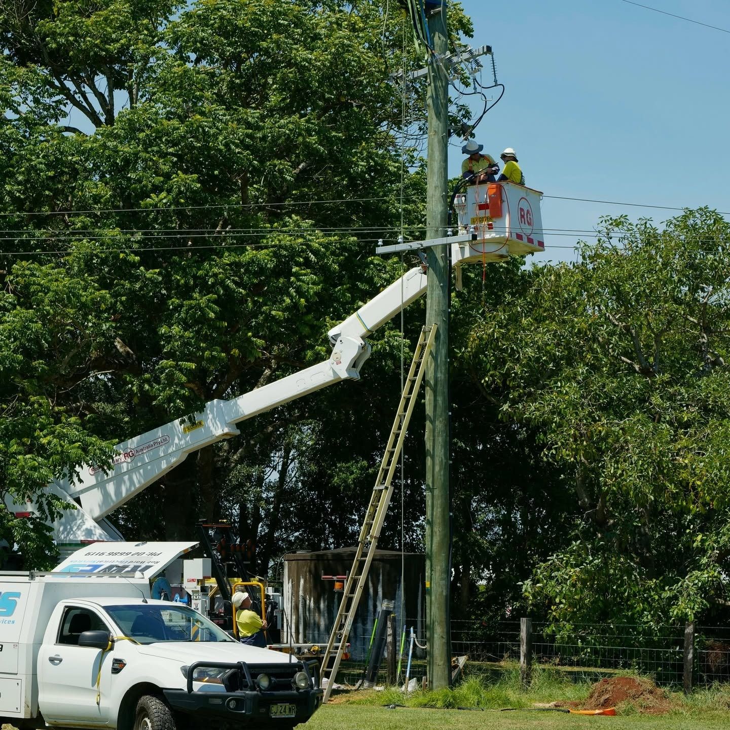 Commercial Electrician Fixing Post in Ballina