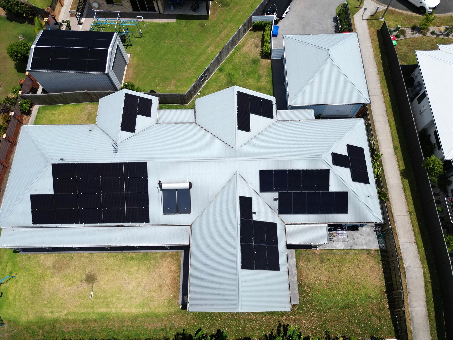 Aerial View of a House With Solar Panels on the Roof — Rob Ward Electrical Services in Kingscliff, NSW