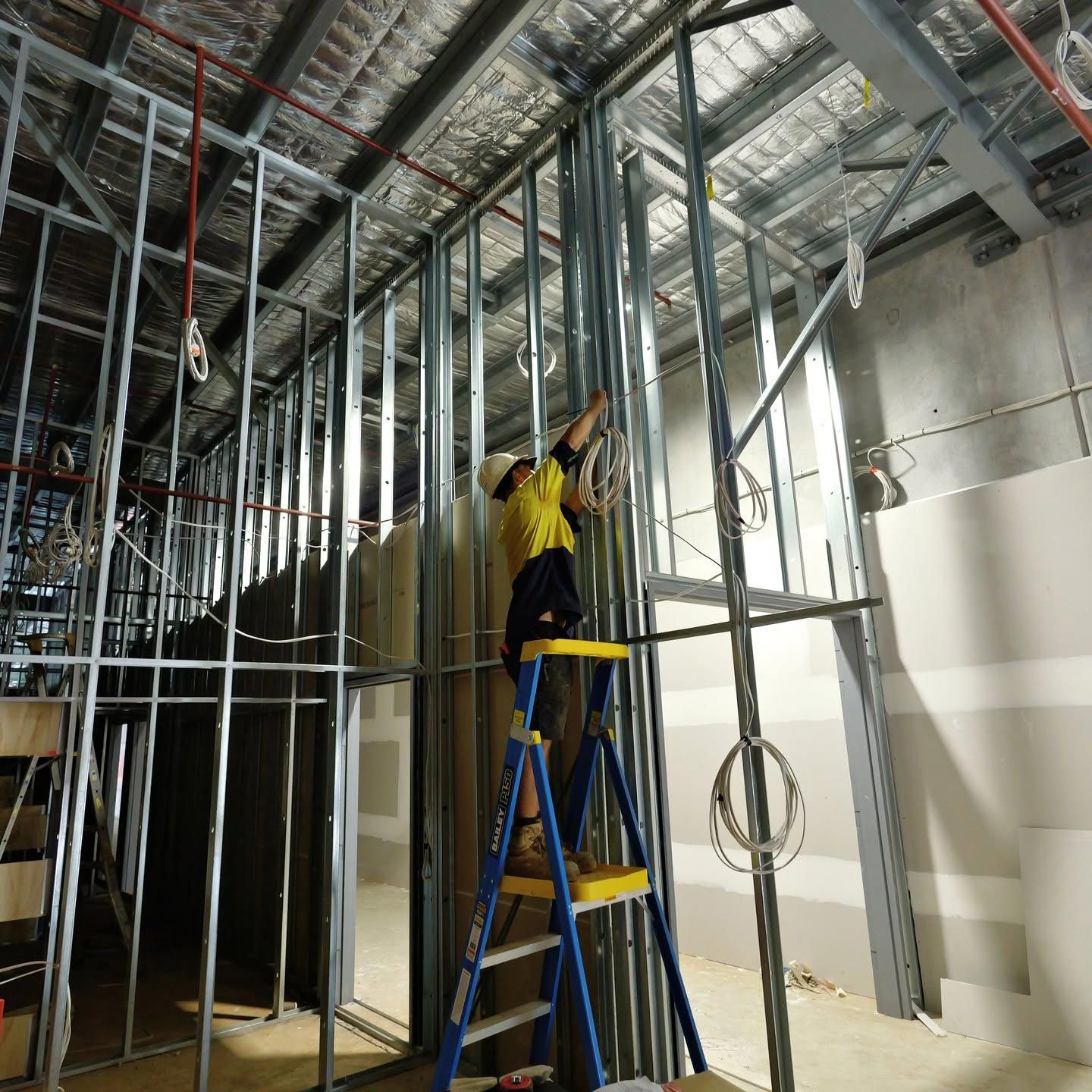 An Electrician In Lismore Installing Electrical Wiring